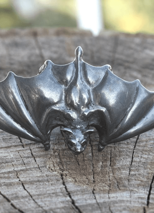 irc black silver bat wing ring with ruby eyes