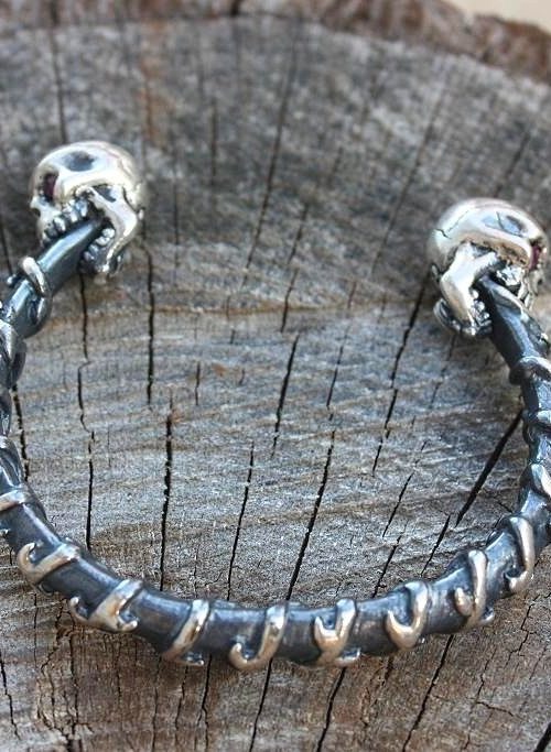 Dual Skull Silver Bracelet with Rubies